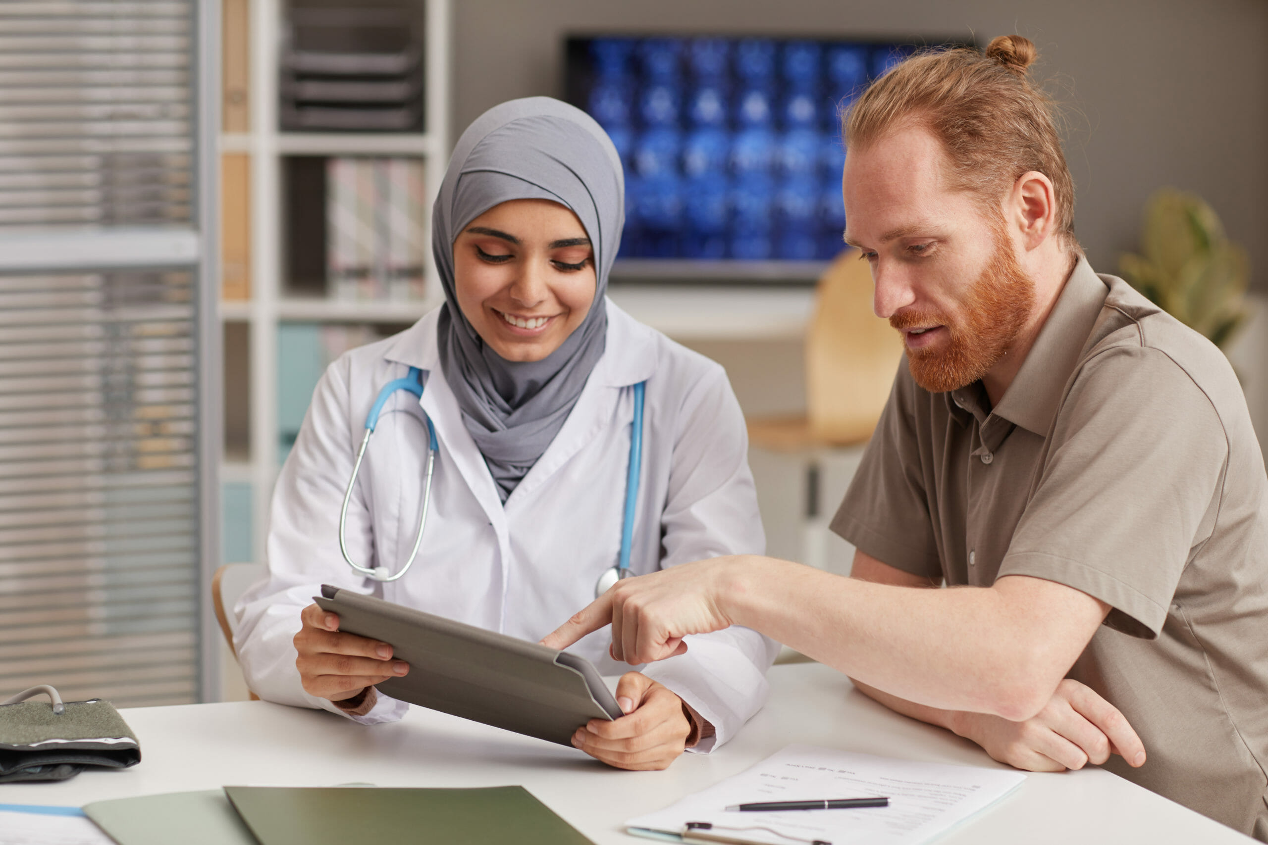 Patient consulting with doctor